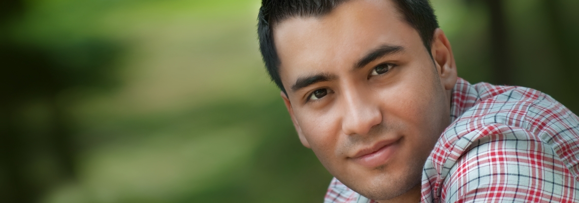 OTEC Community Development Man with black hair looking at the camera