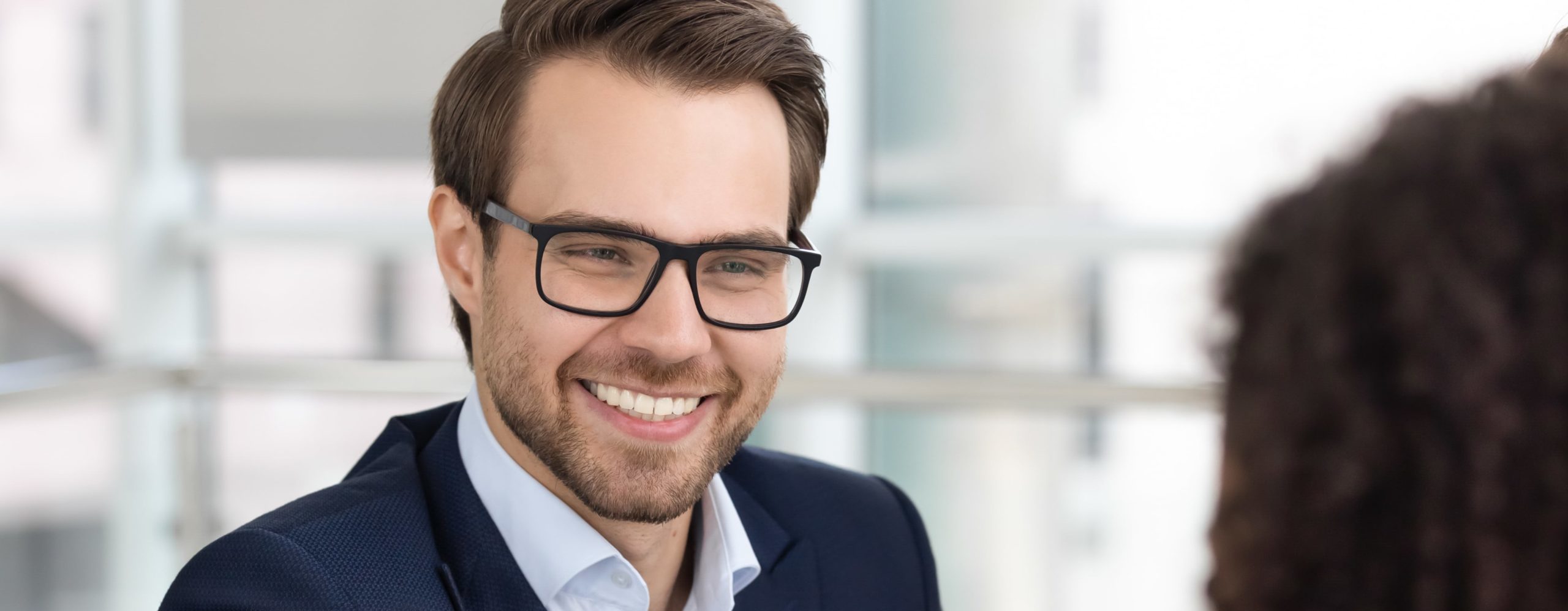 OTEC Careers a man recruiting, selecting and smiling at candidate